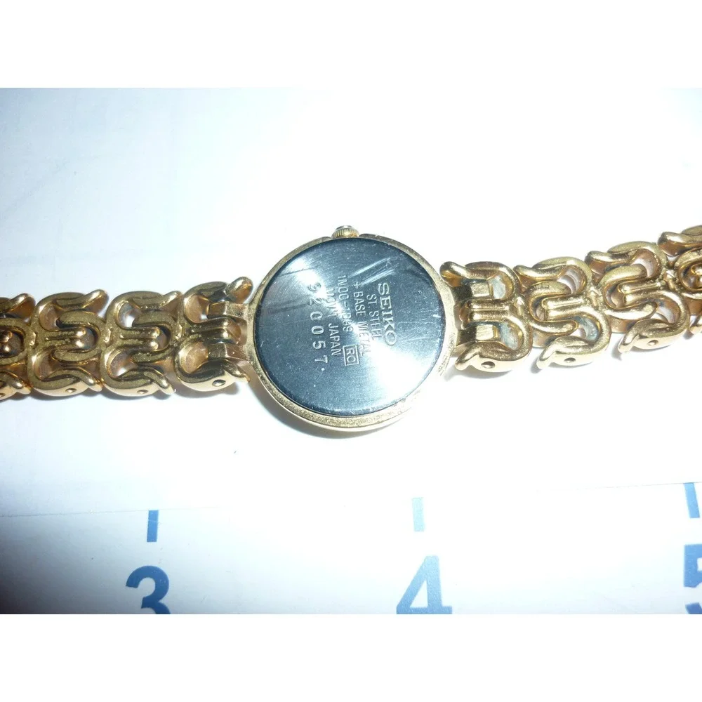 Seiko Womens Gold Tone Fancy‎ Link Bracelet Watch 1N00-1099 Roman Numeral Dial